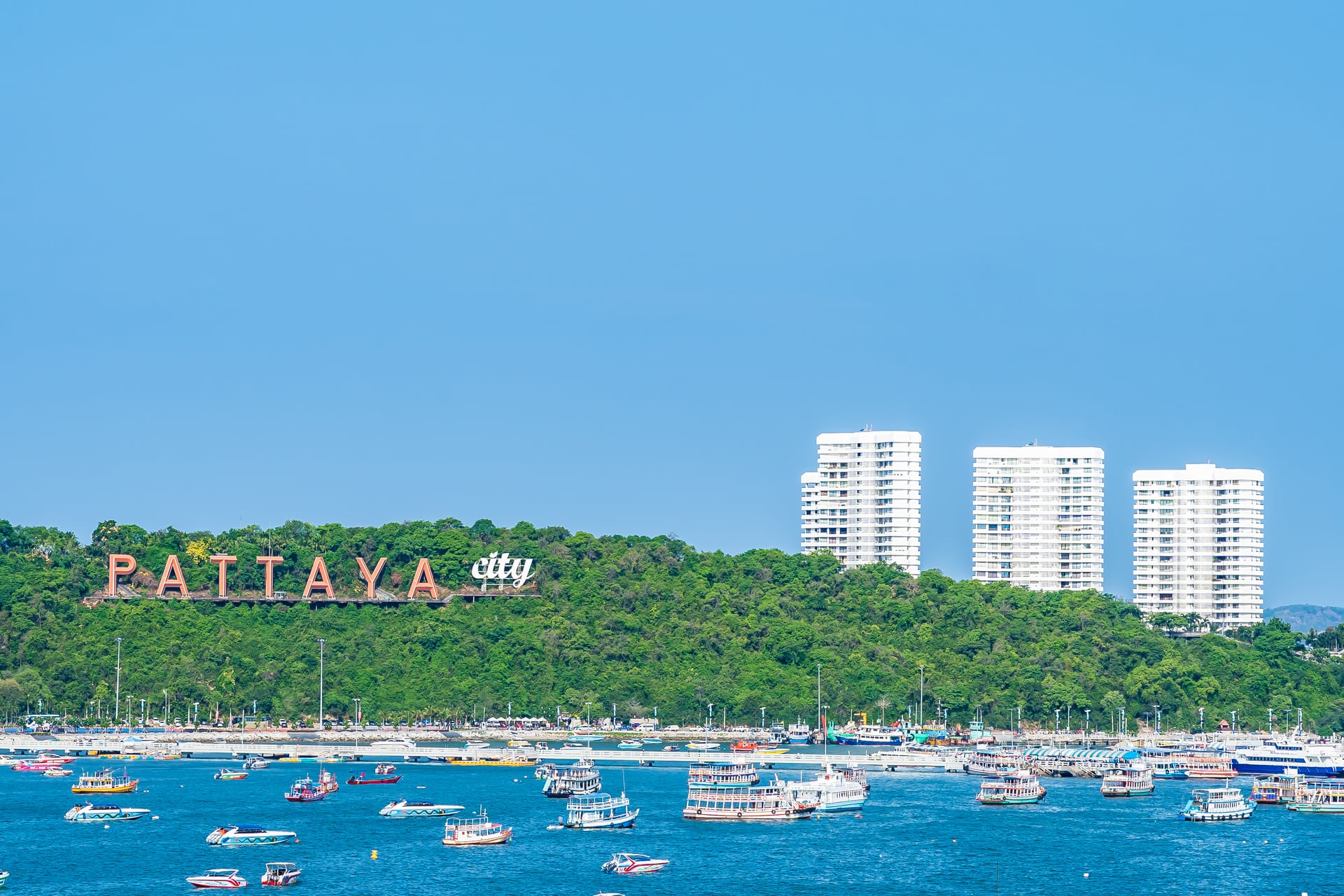 sailboats-sea-by-buildings-against-clear-blue-sky-pattaya-thailand-plans2pick-1773566539191.jpg